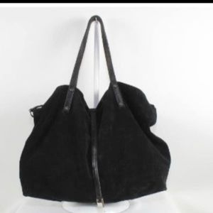 Reversible Tiffany & co. tote. One side black leather metallic and soft suede.